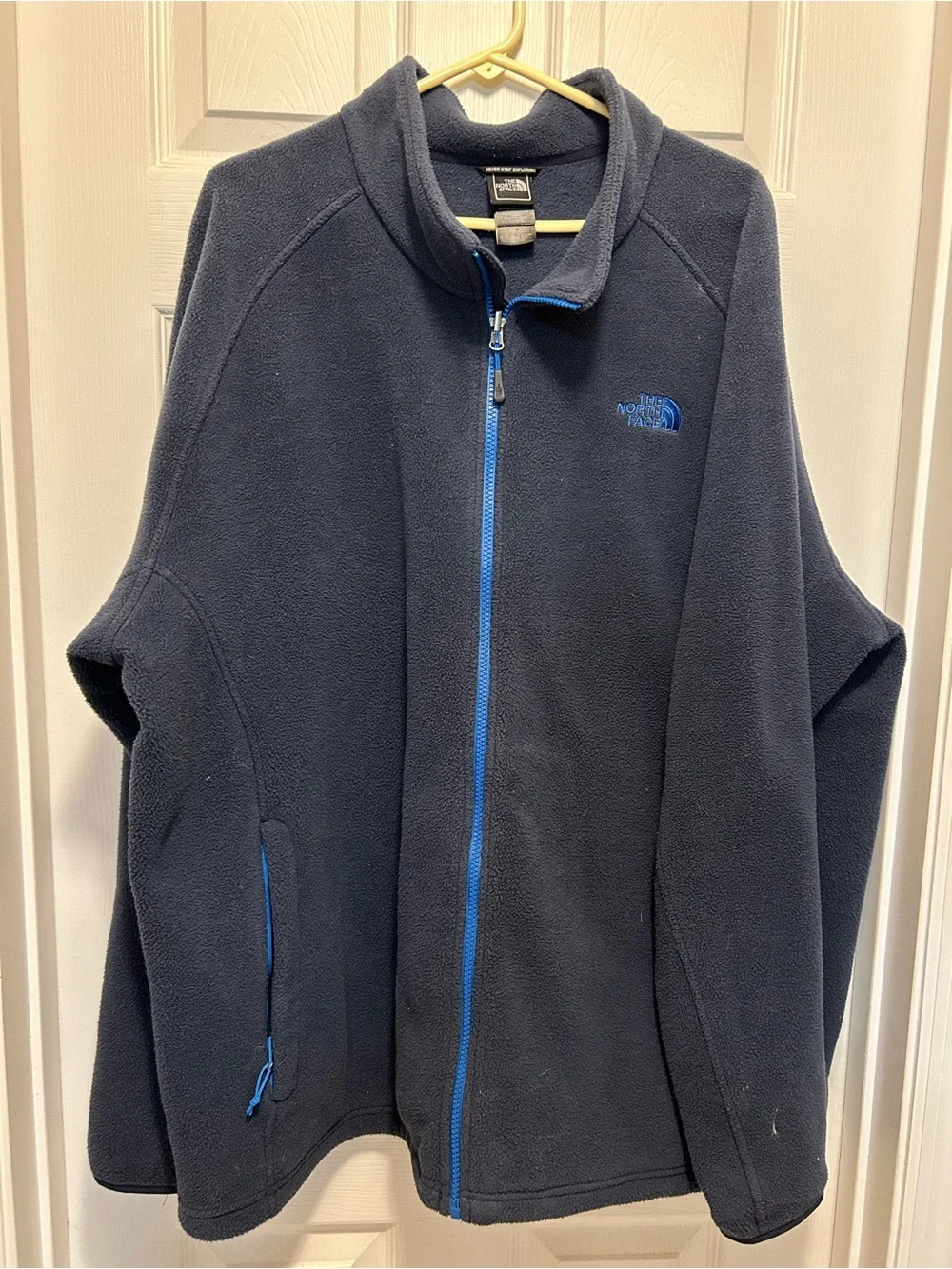 The North Face Navy Blue Fleece Jacket with Bright Blue Zipper